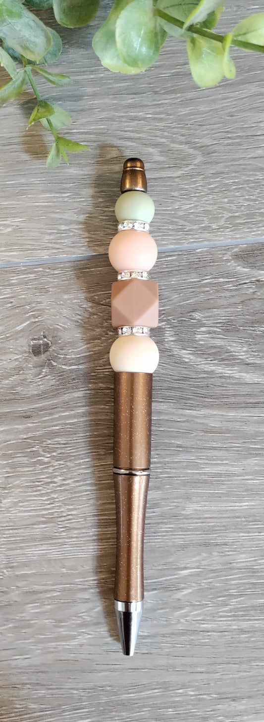 Brown beaded Writing