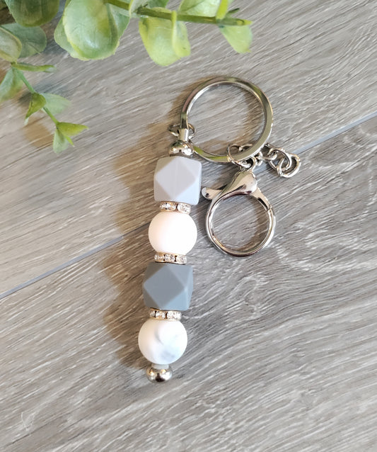 Grey and white beads with silver keychain